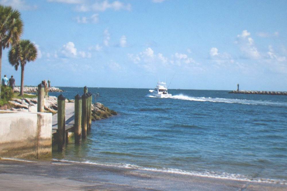 Offshore charter boat running across open Atlantic water