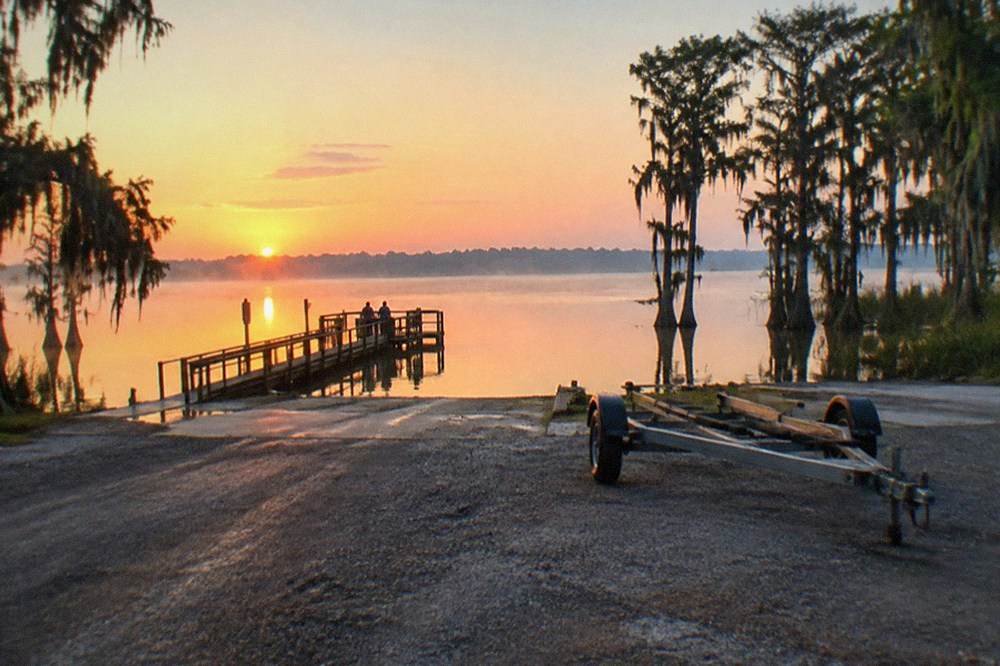 Public boat ramp and dock on a Central Florida lake at sunrise